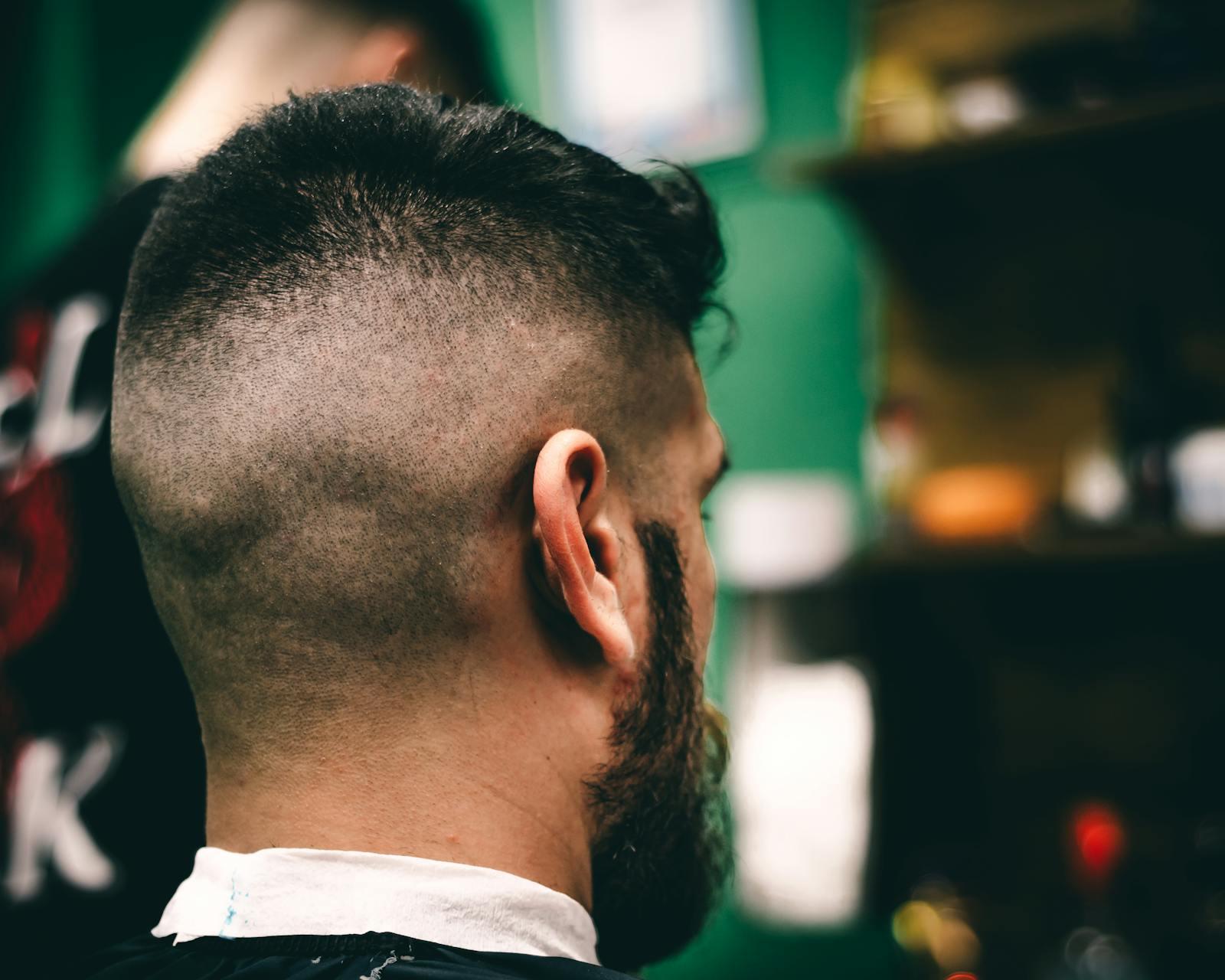 A Sacramento barber's guide to the skin fade haircut — what it is, how it differs from low/mid/high fades, what to say in the chair, and how long it lasts.